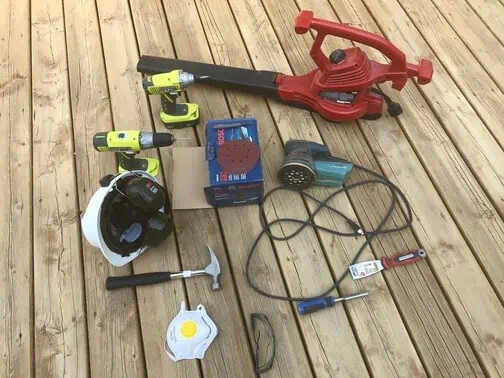 tools and material for sanding and repairing a deck