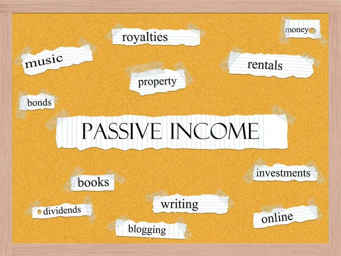 Passive Income Corkboard Word Concept with great terms such as rentals, money, royalties and more.